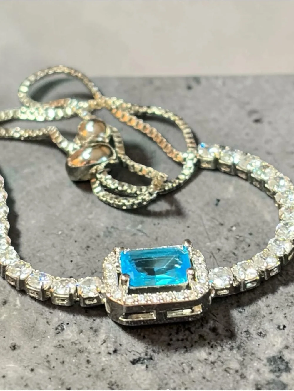 Adjustable Silver Bracelet with Blue Stone Accent